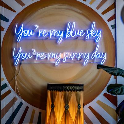 Interior, neon sign on the wall