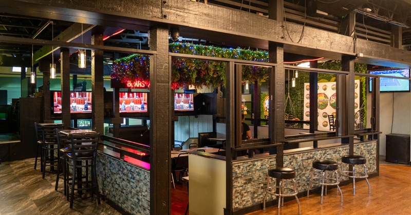 Interior, seating area, high seating tables for two, seating area on a lower level