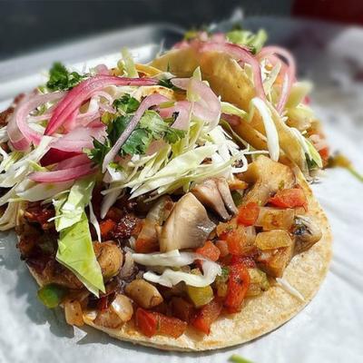 Close-up of a taco wit various topings.