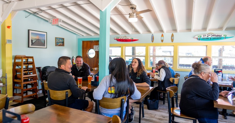 Interior, diner and bar area, tables, chairs, people