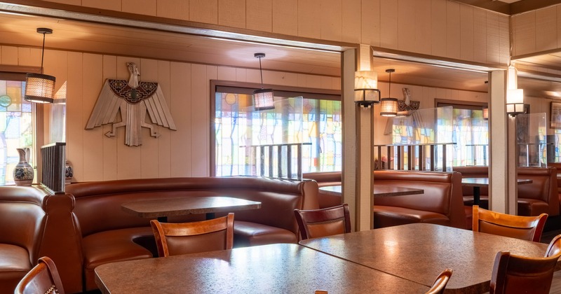 Interior, tables and chairs near restaurant booths