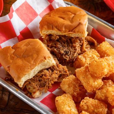 Pulled pork sliders and tater tots.