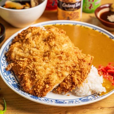 Chicken katsu served with curry and rice.