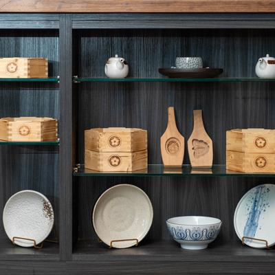 Various plates, bowls, wooden boxes, and tea sets.