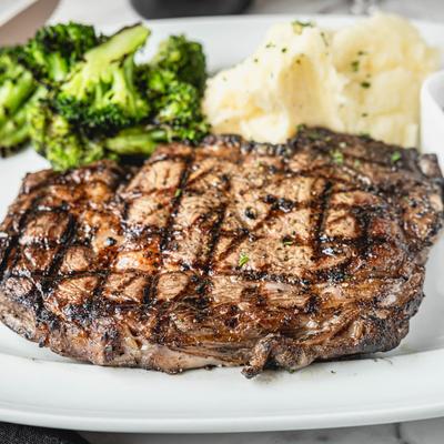 Grilled Ribeye, with broccoli and mashed potatoes.