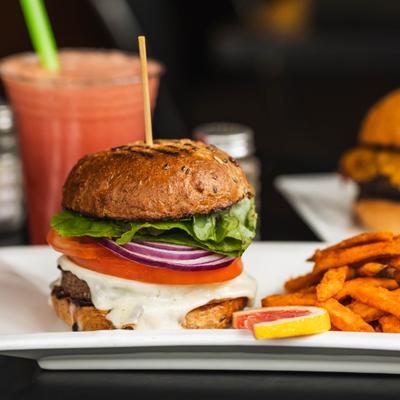 Bison cheeseburger with sweet potato fries.