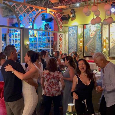 People dancing while the band plays.
