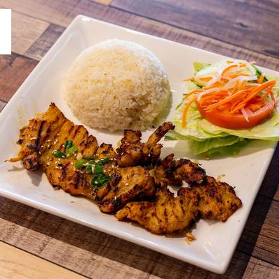 Grilled chicken, rice and salad.