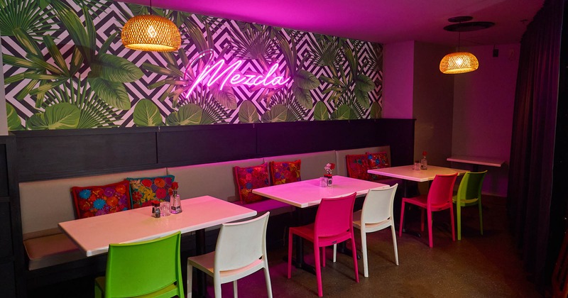 Interior, dining area with a large picture on the wall