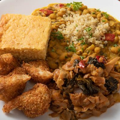 Coconut chickpeas with greens, cornbread and cauliflower