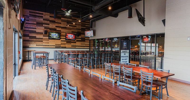 Interior, long table setups for twelve and eight, high and regular seating