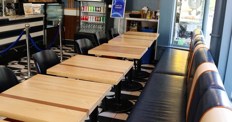 Interior, seating area with row of tables