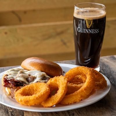 Brisket Onion rings and a dark Guinness beer.