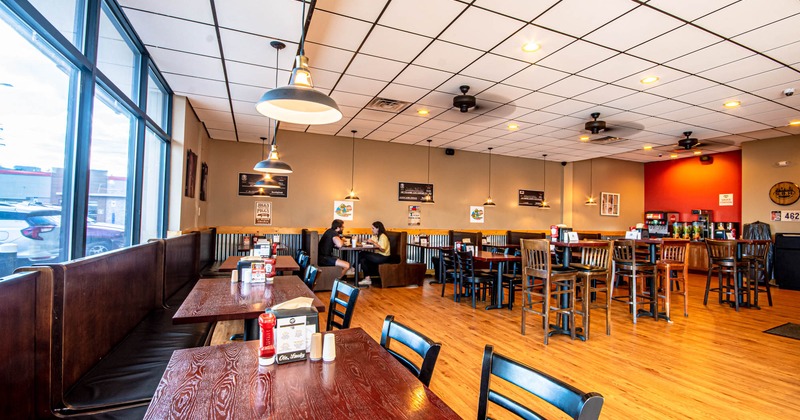 Interior, dining tables and seating, two guests dining