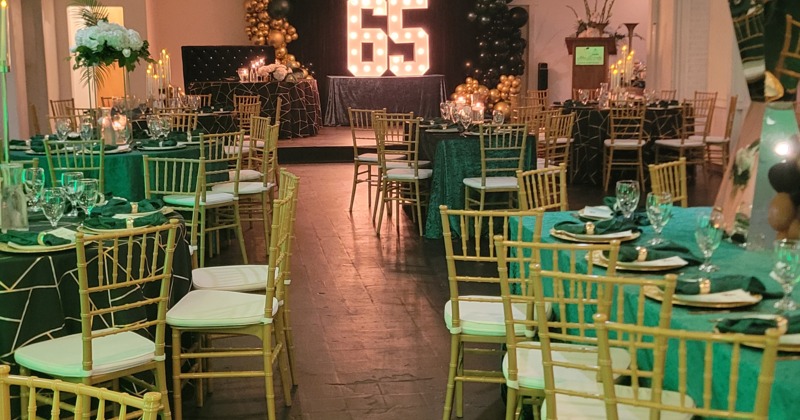 Dining tables with green tablecloth