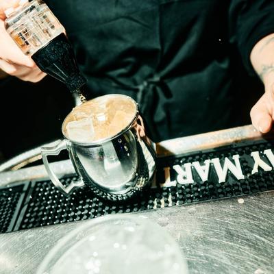 Bartender making coffee.