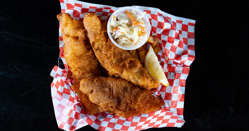 Fish and chips with a side of coleslaw