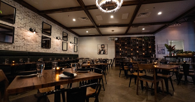 Interior of a modern restaurant with wooden tables and chairs
