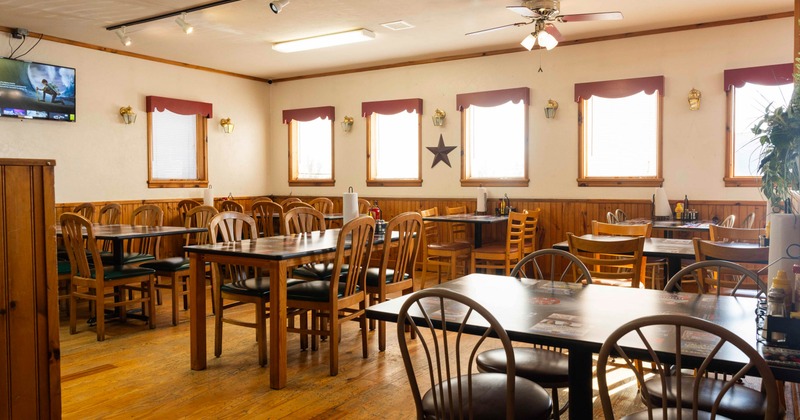 Interior, seating area with tables and chairs