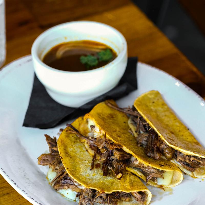 Quesa Birria Tacos (3) and Consome photo