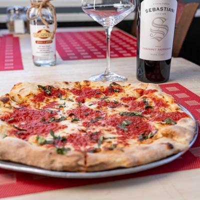 Margherita pizza and wine.