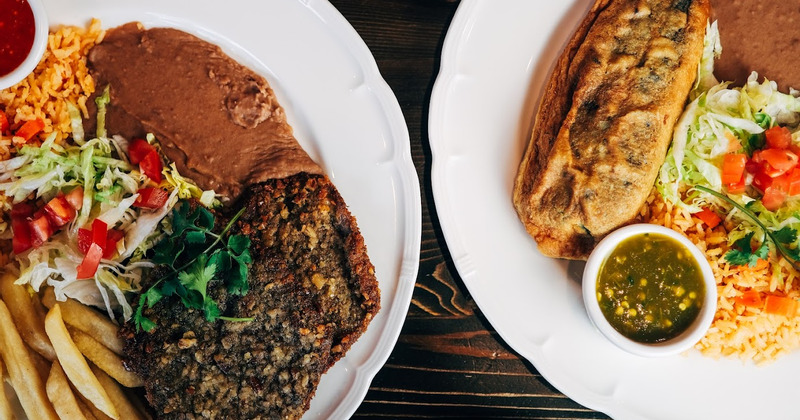 Two dishes from the menu served, top view