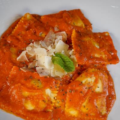 Ravioli, in sauce