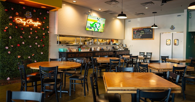 Restaurant interior, dining area with tables and chairs