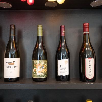 Assorted wine bottles.