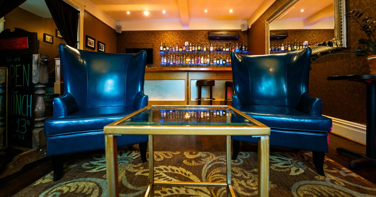 Interior, two leather armchairs and coffee table