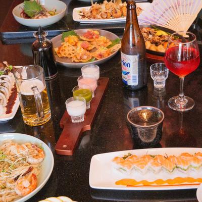 A spread of various dishes and drinks.