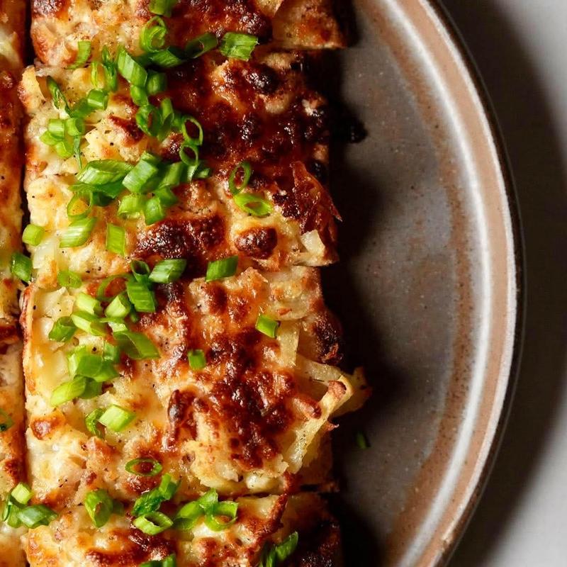 House Pizza | Olive Oil | Shredded Potatoes | Mozzarella photo