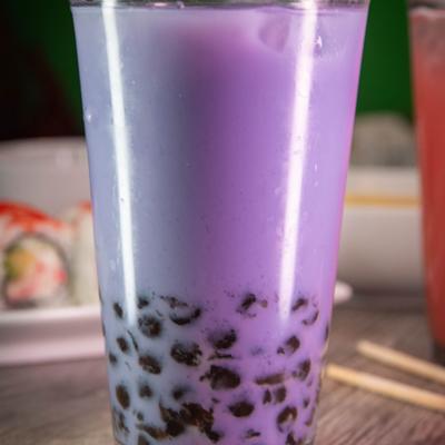 Purple bubble tea with tapioca pearls.