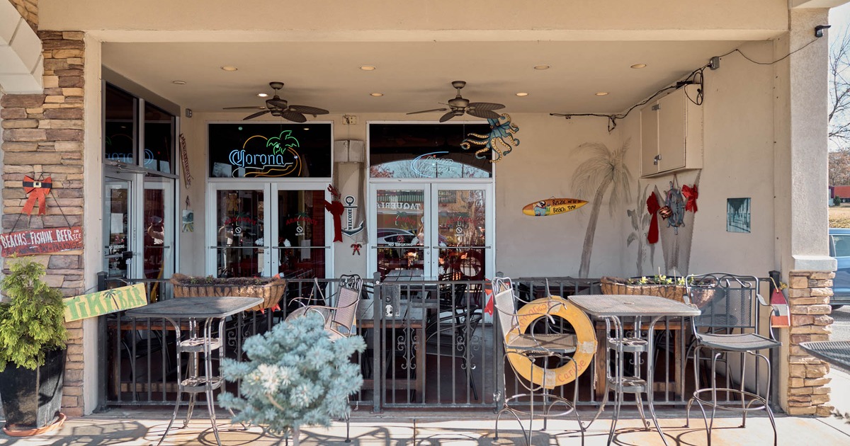 Exterior, tables and chairs at the entrance