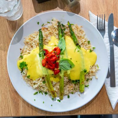 Salmon Oscar dish with rice and asparagus.