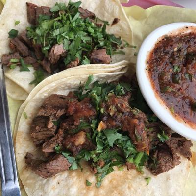 Taco with beef and greens