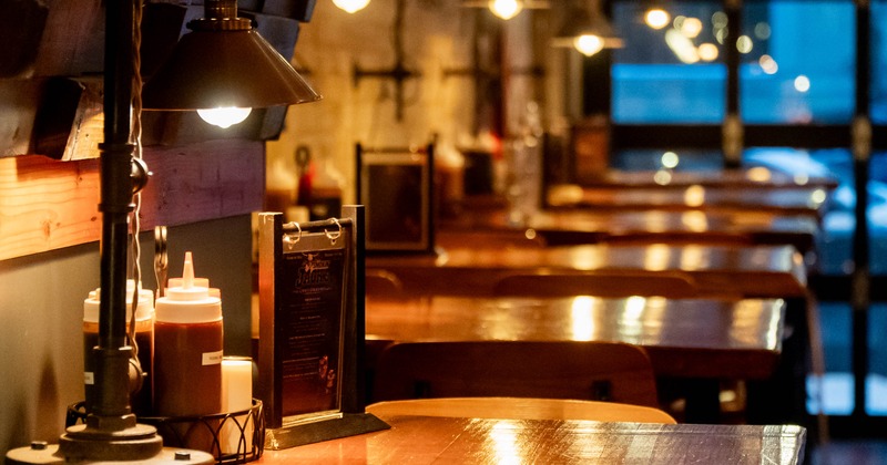 Cozy restaurant interior with wooden tables