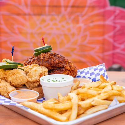 Fried chicken with sauce dips and fries