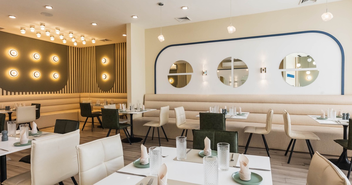 Inside, seating area, tables ready for guests