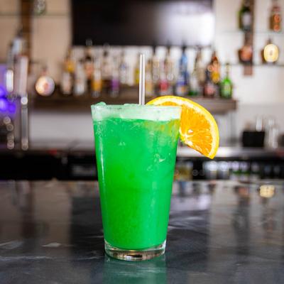 Liquid Marijuana cocktail placed on a bar counter.