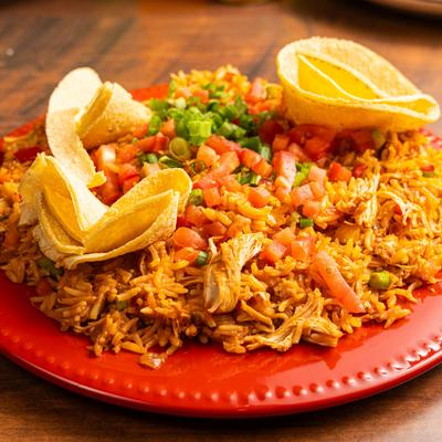 Rice with pulled chicken and crispy fried tortillas.