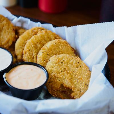 Fried green tomatoes, with dipping sauces.