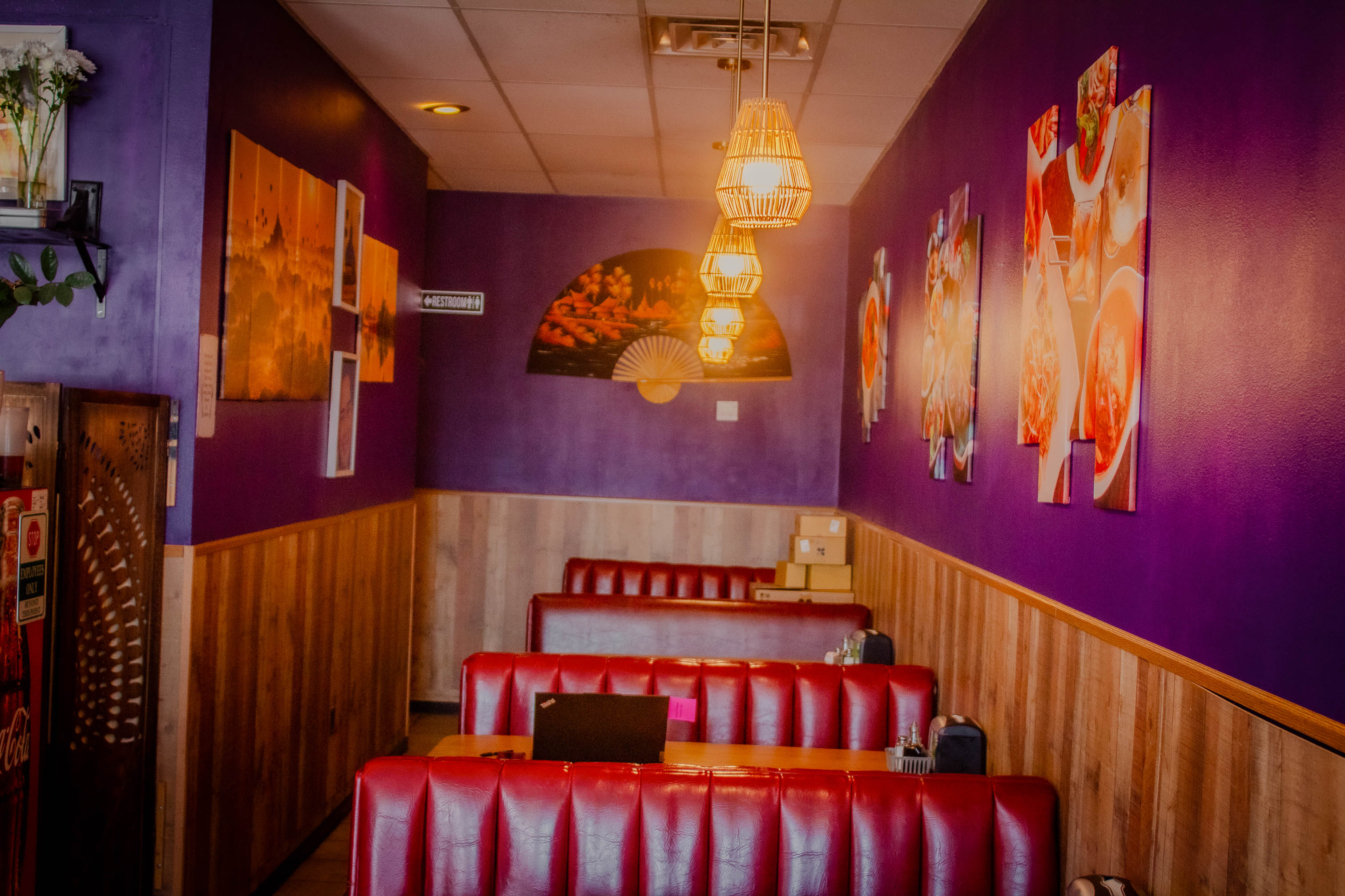 Interior with boots, tables and wall decorations