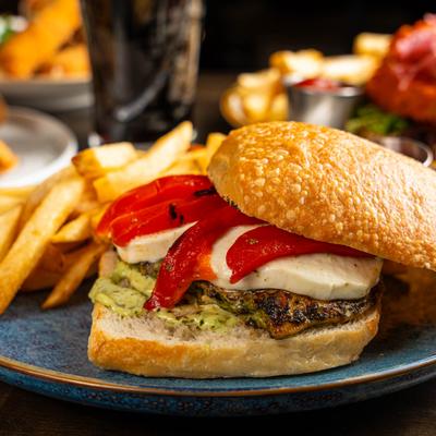 Pesto Chicken Sandwich with fries.