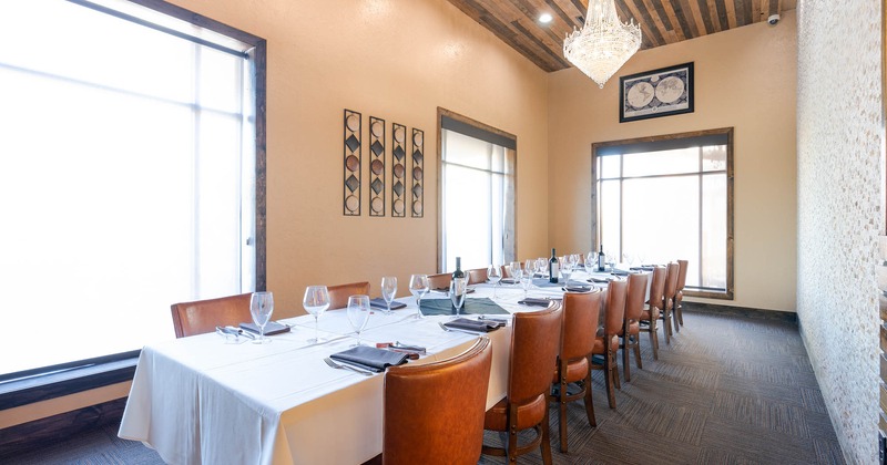 Interior, dining area, big windows, tables set and ready for guests