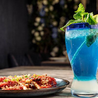 Crispy lotus dish and a blue lemonade.