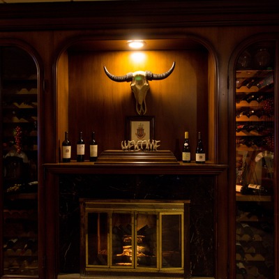Interior, fireplace and various wall decorations.