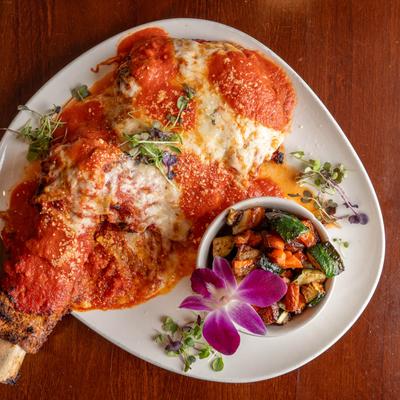The bone in veal parm plate, top view.