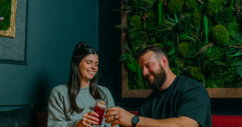 Couple toasting with glasses