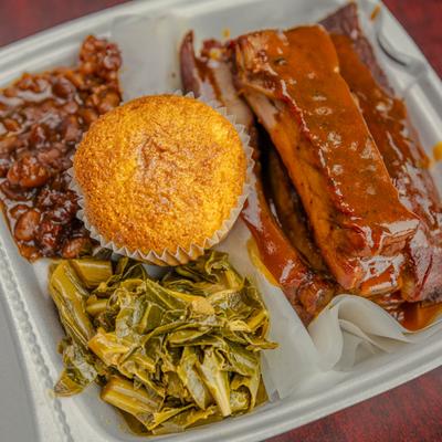 BBQ ribs with side dishes.
